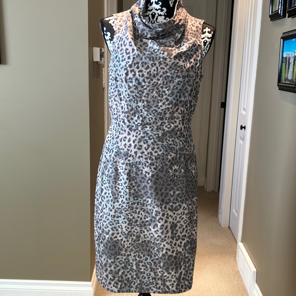 Fabulous animal print high neck dress w/fitted waist & invisible zip down back.